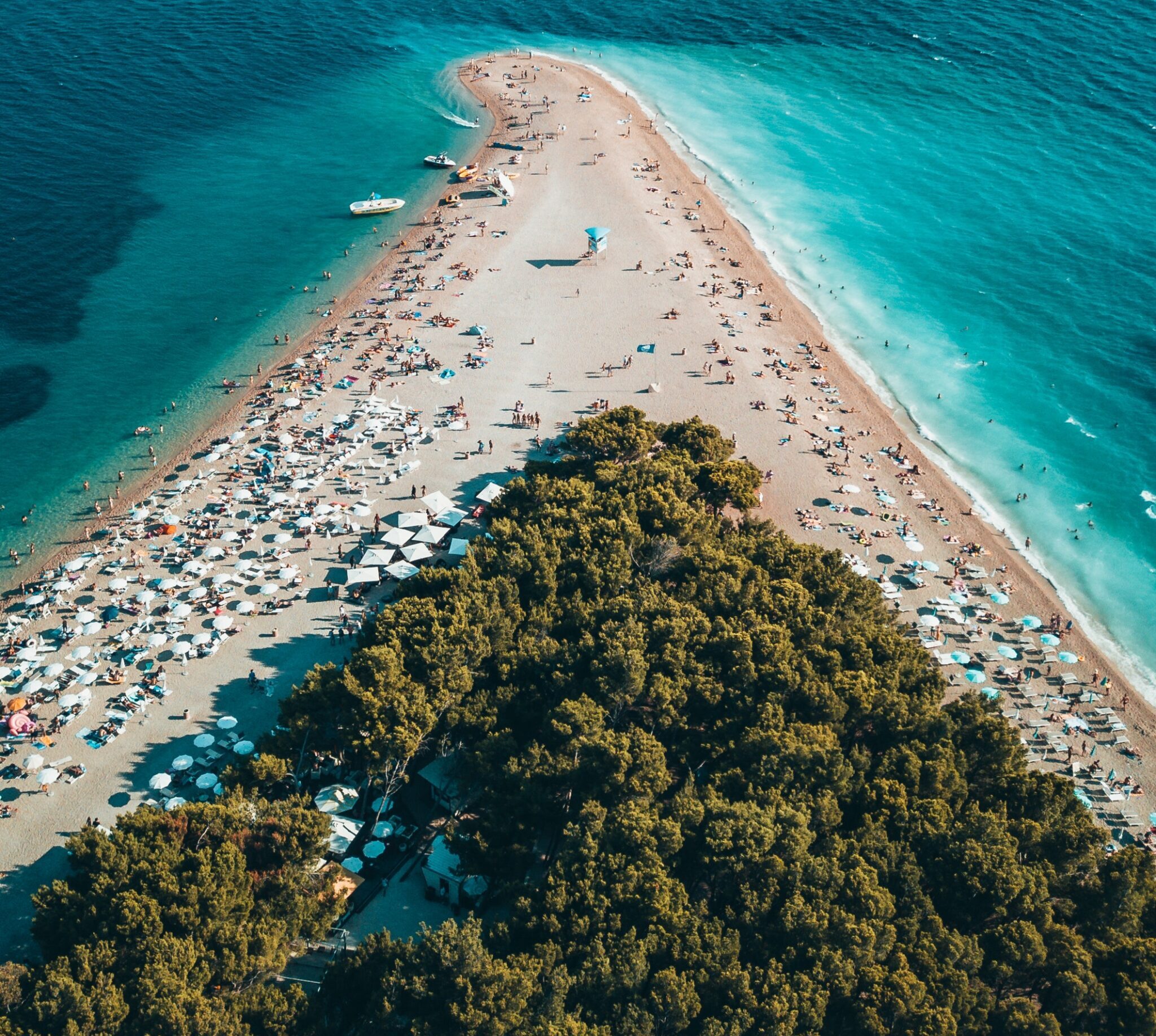 A beach at a turquoise sea