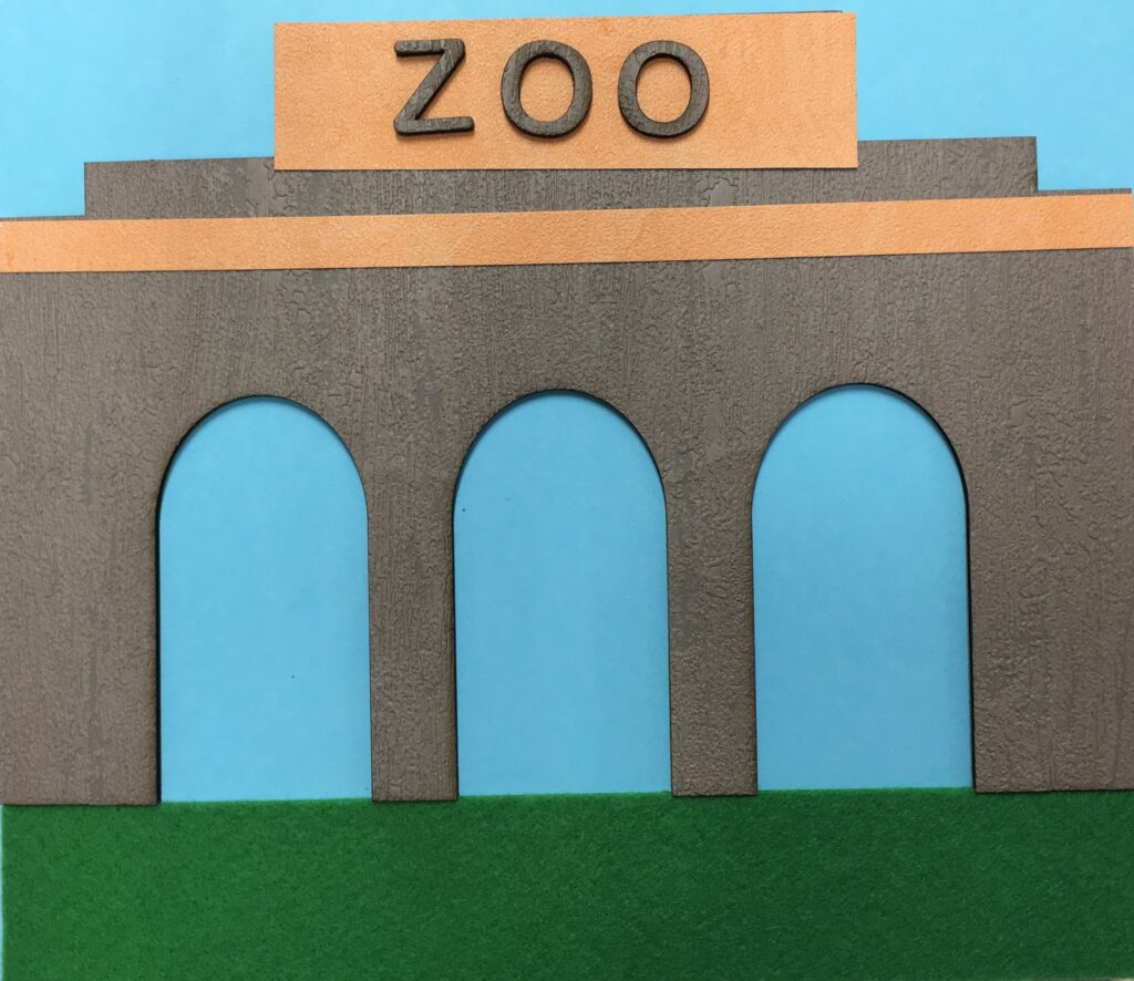 Il·lustració en relleu de l'entrada al Zoo.